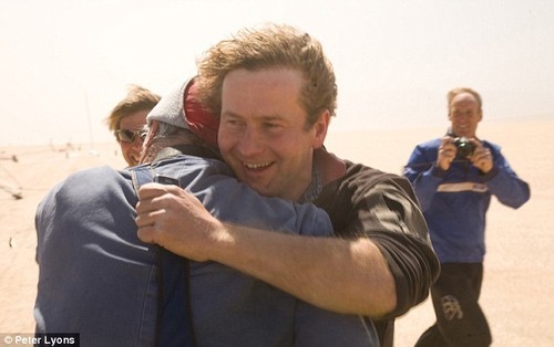 A hug for the fastest sailing human Richard Jenkins - photo by Peter Lyons © SW